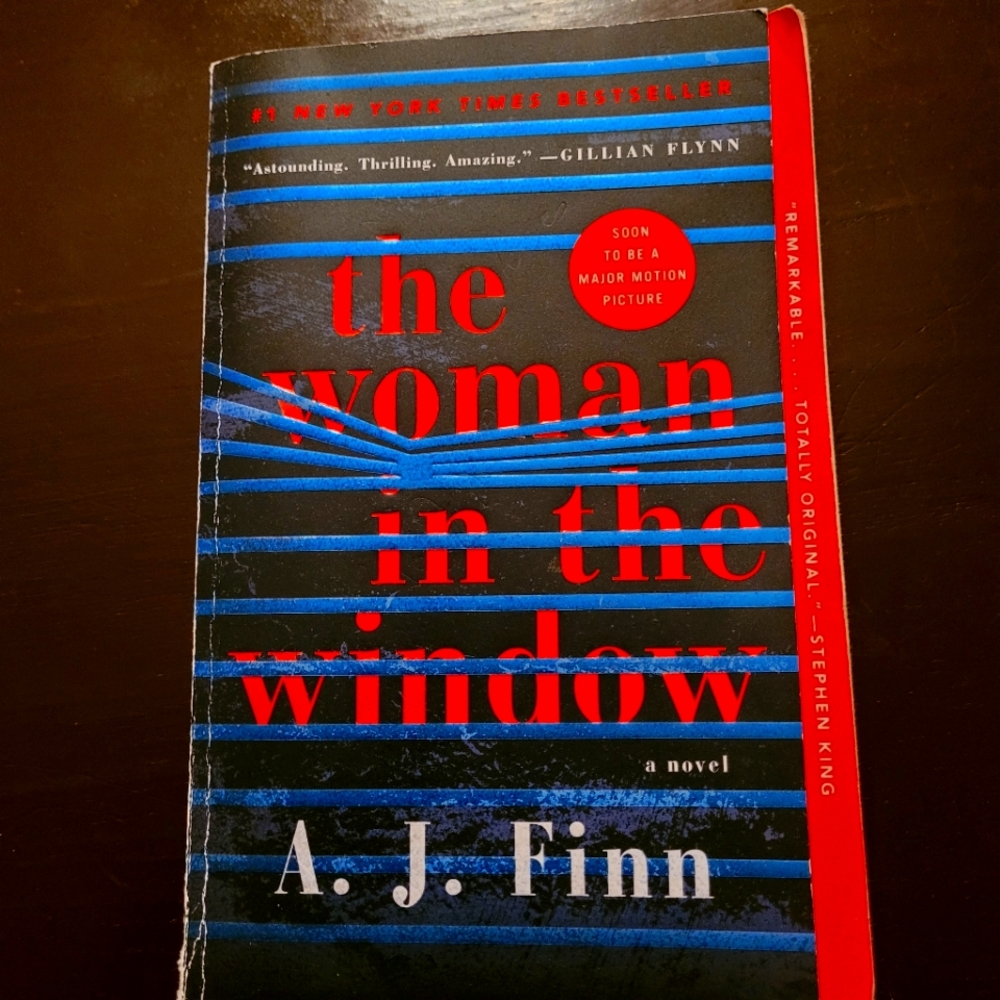 A Paperback from WM Morrow, the woman in the window by: A.J. Finn